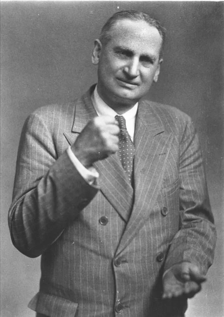 Governor Langer’s pose in this portrait shows his characteristic energy.